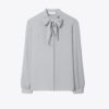 Blus med rosett i georgette Blus med rosett i georgette