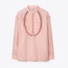 Blus med volanger fram Blus med volanger fram