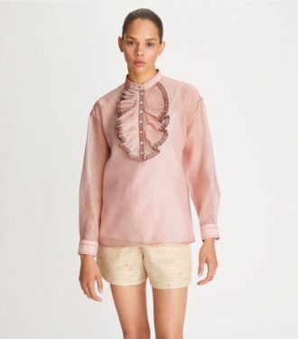 Blus med volanger fram