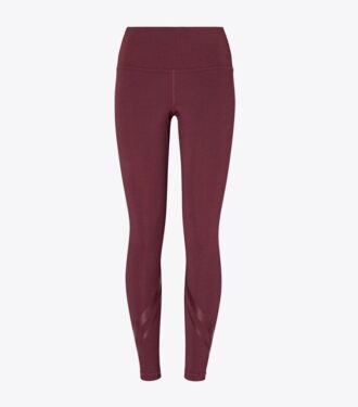 Högmidjade kompressionsleggings med sidfickor och chevronmönster Högmidjade kompressionsleggings med sidfickor och chevronmönster