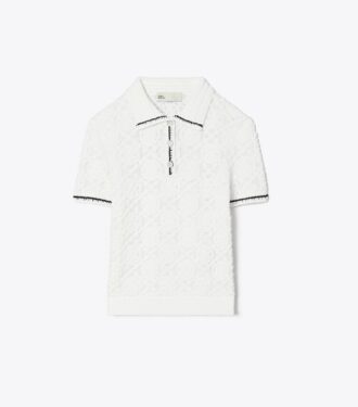 Polo i bomull med logotyp i spets