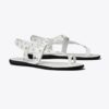 Sandaler med öglor vid tårna