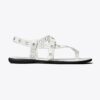 Sandaler med öglor vid tårna