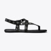 Sandaler med öglor vid tårna