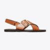 Sandaler med korsade remmar