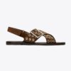 Sandaler med korsade remmar