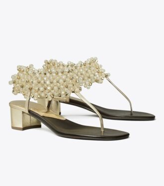 Sandaler med pärlbroderad klack
