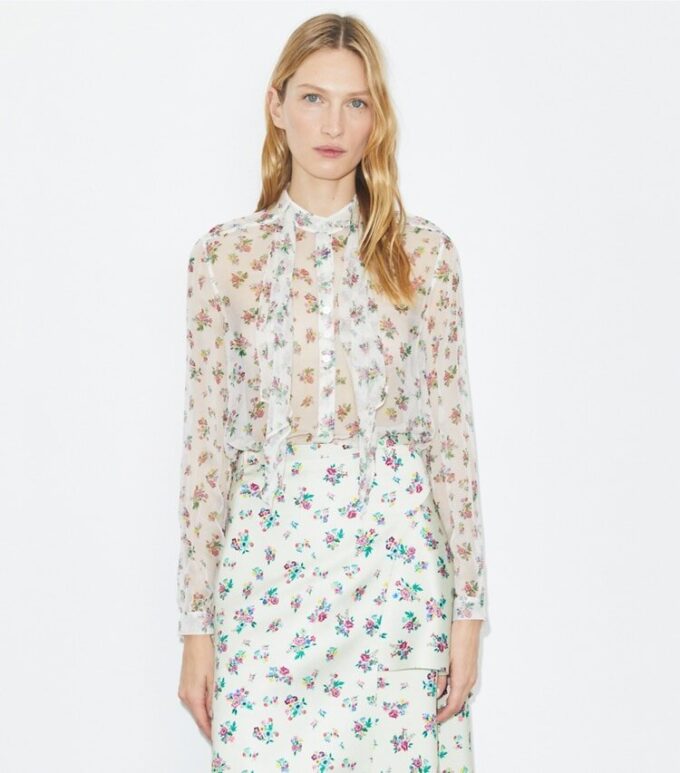 Silkesblus med rosett Silkesblus med rosett