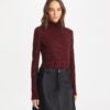 Turtleneck i viskosjersey med dekorationer