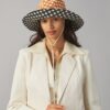 Vändbar bucket hat i rutigt tyg Vändbar bucket hat i rutigt tyg